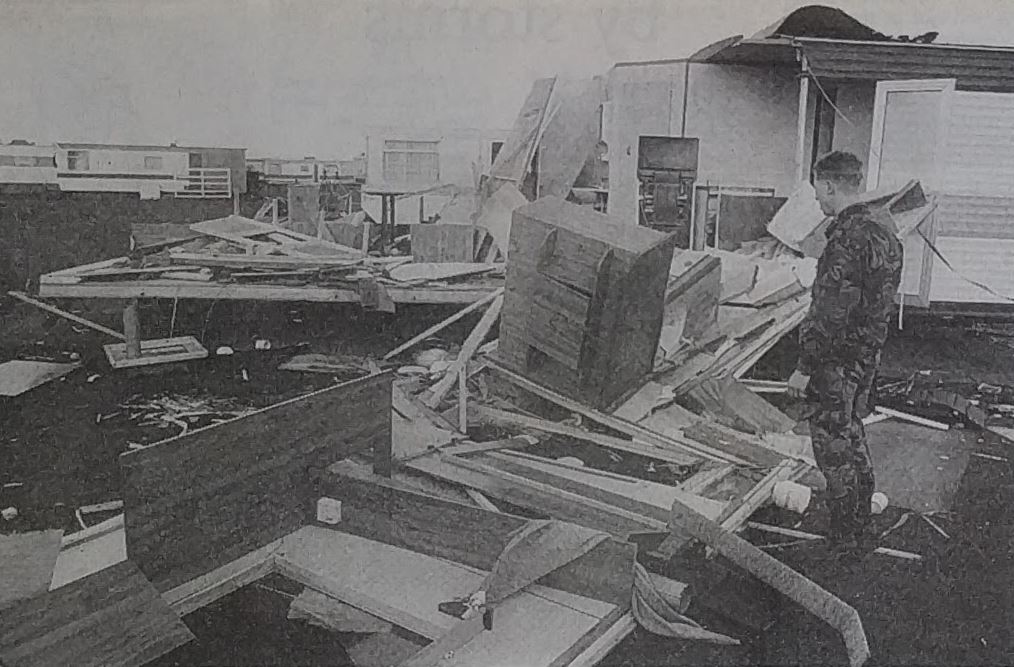 A soldier keeps watch at the scene at White Sands Caravan Park, Selsey